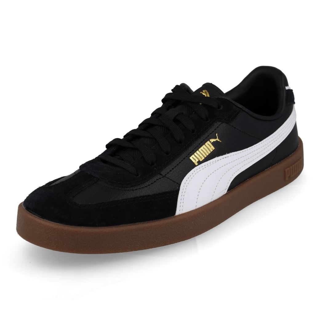 Close tênis Puma preto com sola gum marrom e detalhes em camurça